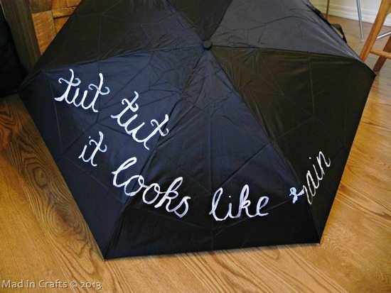 hand-paint-the-quote-on-umbrella_thu