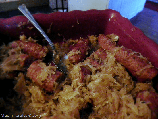 sauerkraut and sausage in a serving dish
