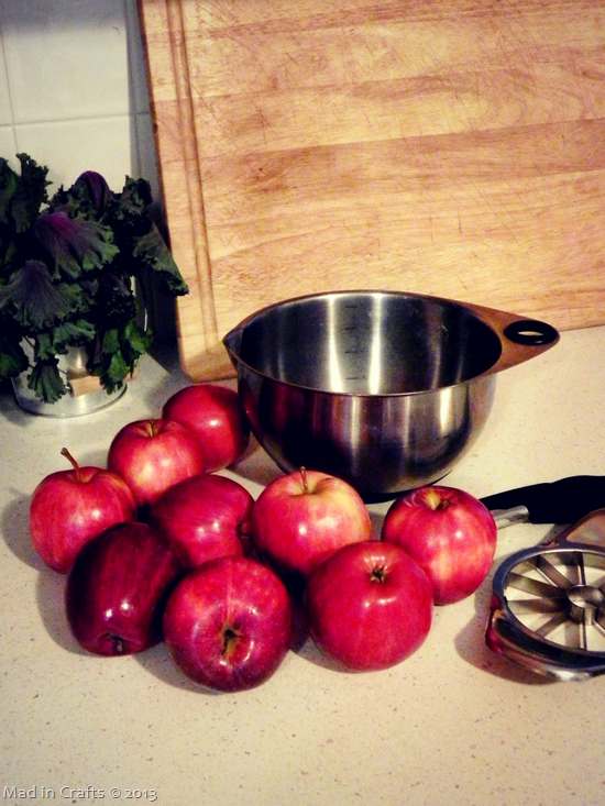 red apples near a metal bowl