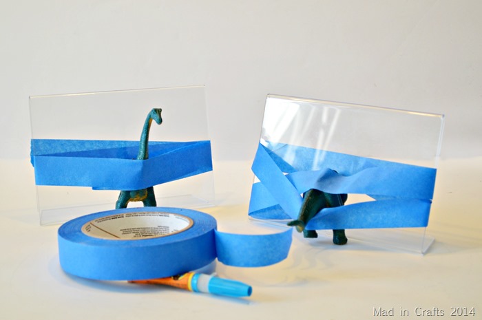 Plastic Animal Bookends tape halves in place to dry