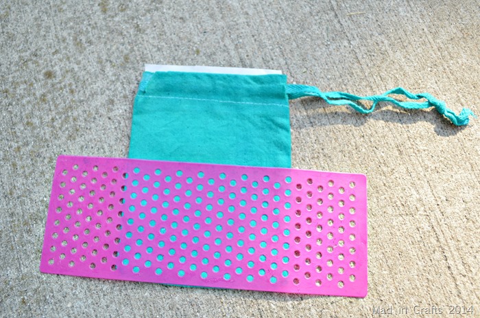 Apply stencil to dyed bag