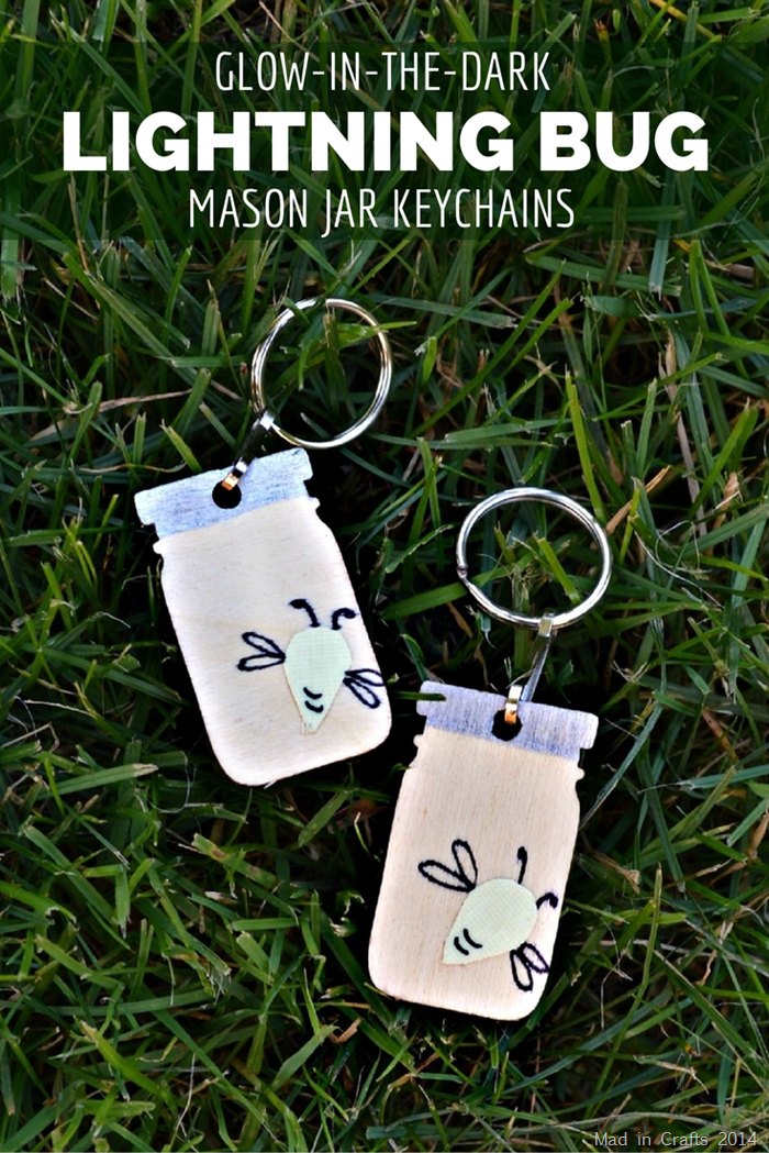 mason jar key chains with glow in the dark fireflies on grass