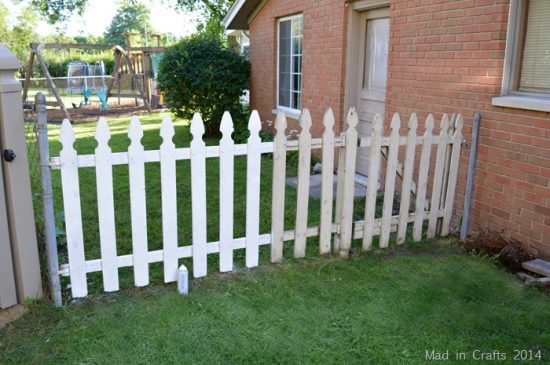 spray-painting-a-picket-fence-mad-in-crafts