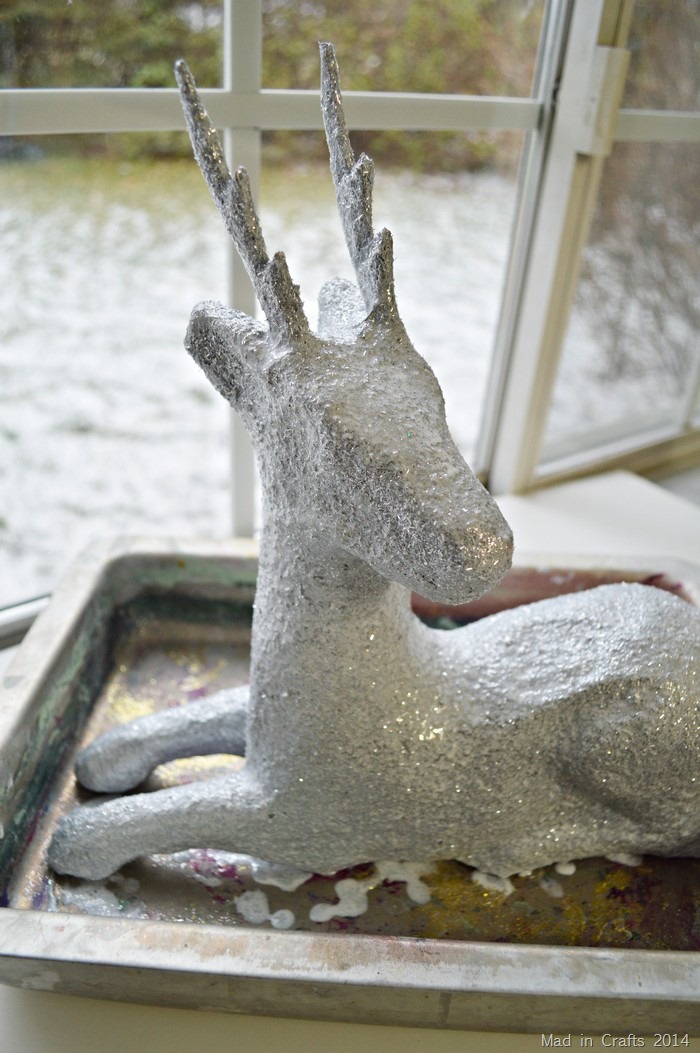 closeup of silver glitter on a paper mache deer
