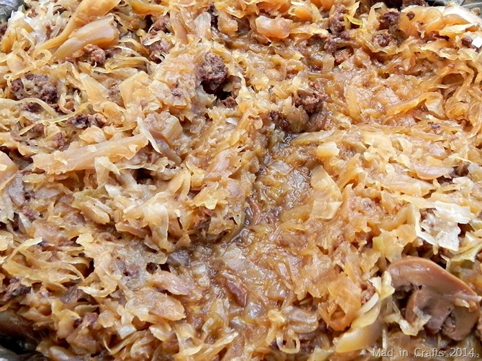 close up of kapusta saurkraut with sausage