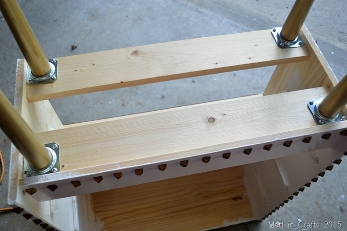 bottom view of an IKEA dresser with added supports and legs