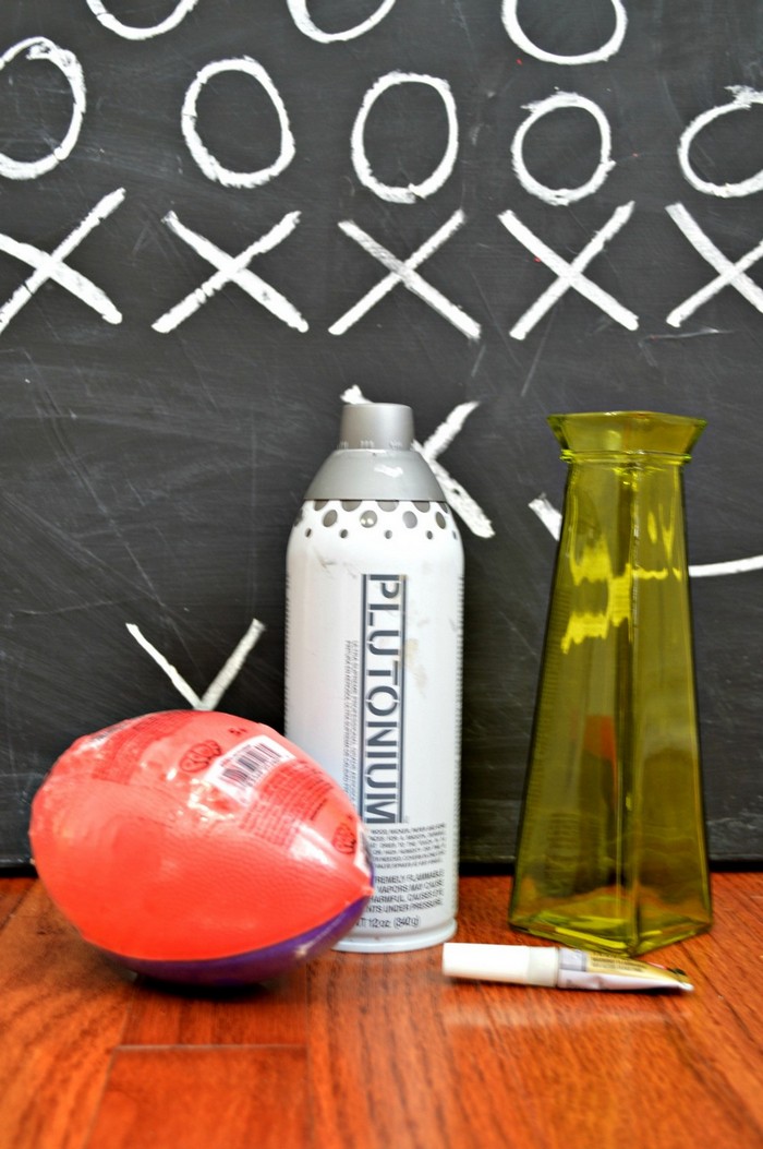 foam football, spray paint and dollar store vase