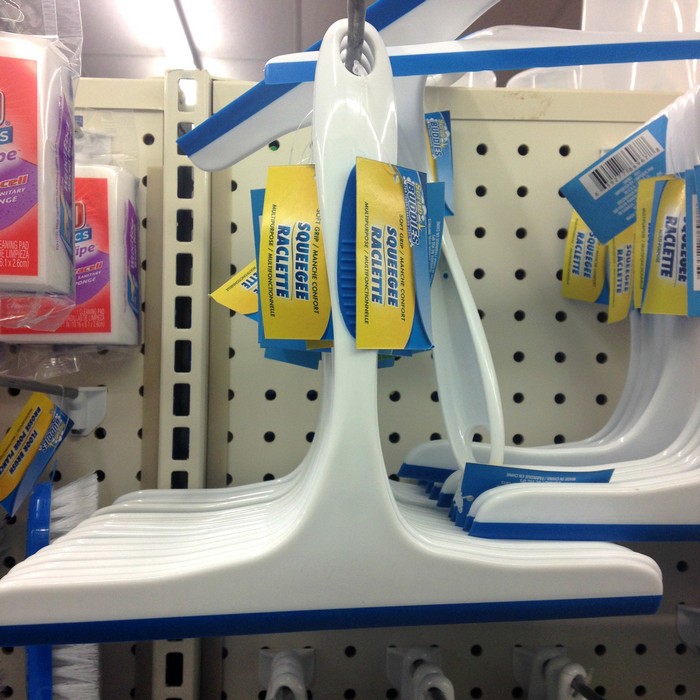 Squeegees hanging on a store display