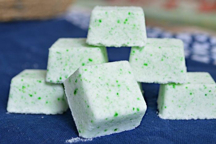 a stack of green and white Peppermint Foot Soak Bombs 