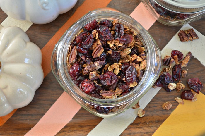 top down photo of a mason jar of maple pecan granola