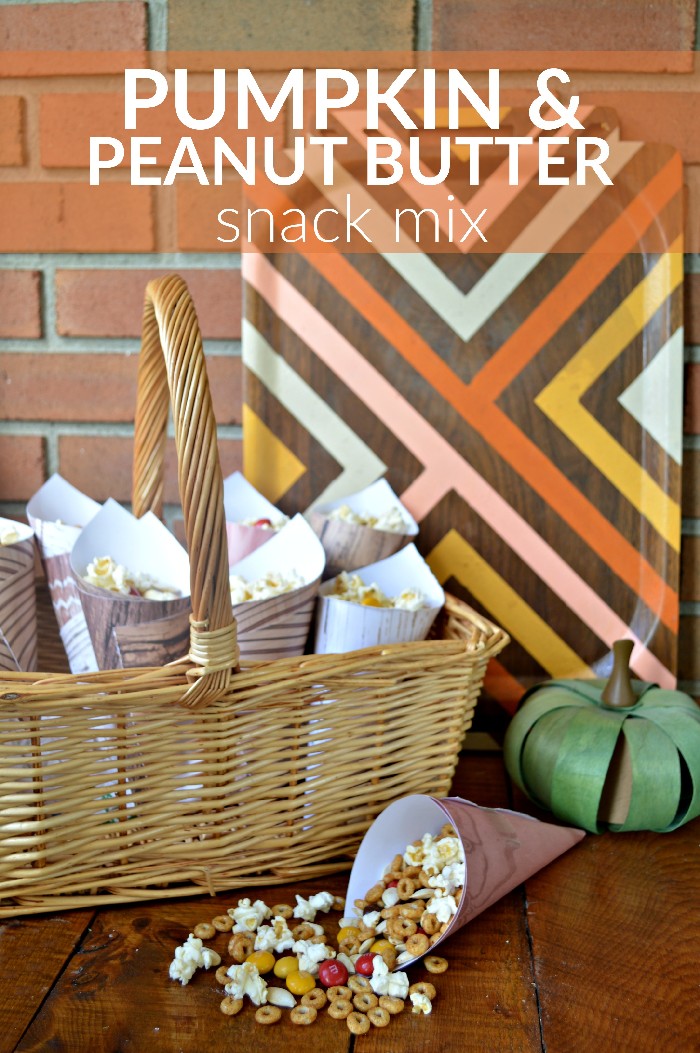 basket with paper cones of snack mix