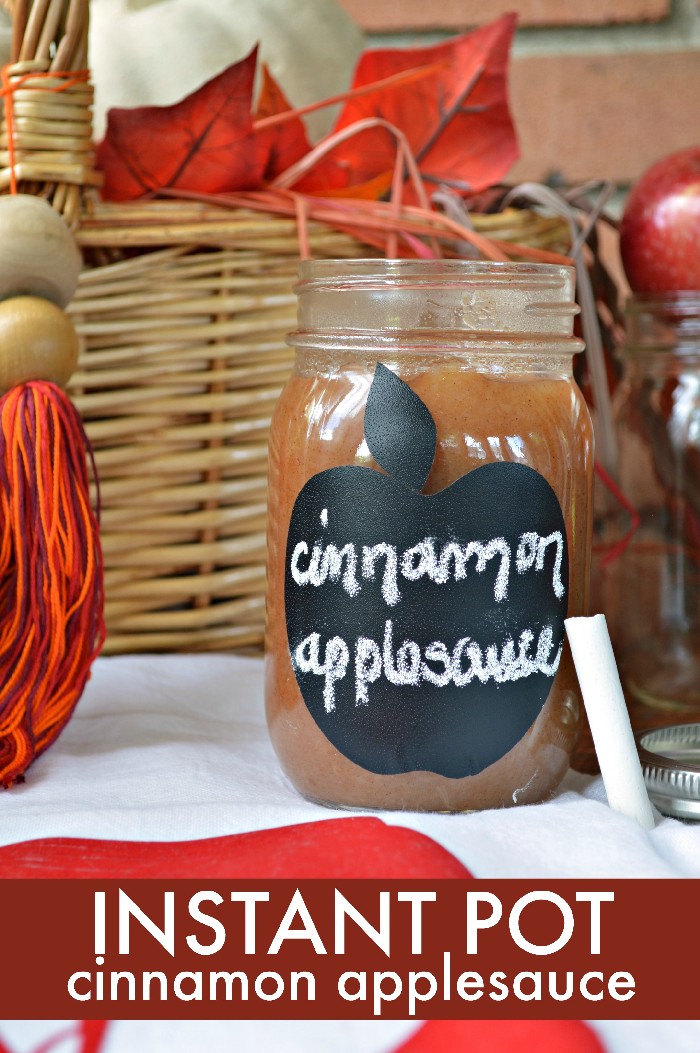 jar of cinnamon applesauce in a mason jar with a chalkboard label