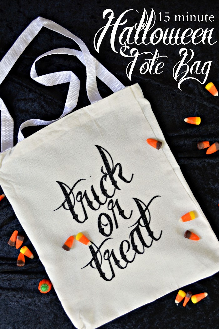 trick or treat tote bag and candy corn on a black background