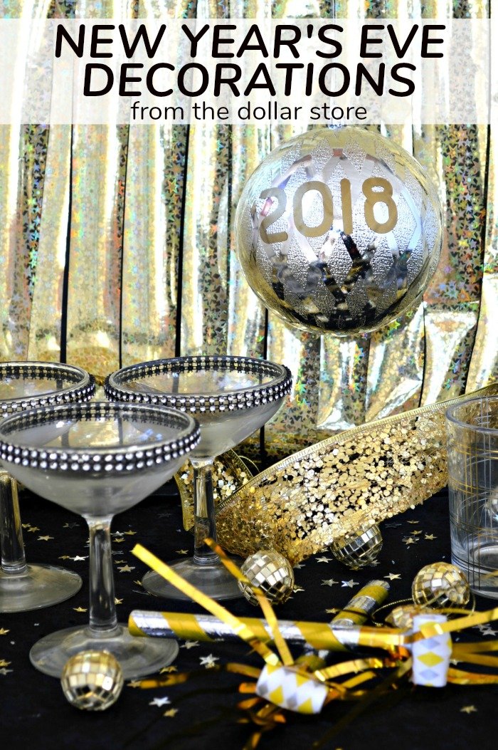 champagne coupes and gold glitter new year\'s decorations