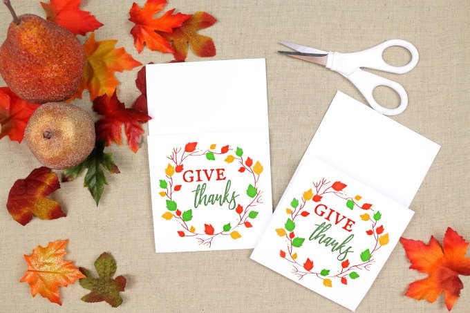 printable utensil holder on a table with fall leaves and scissors