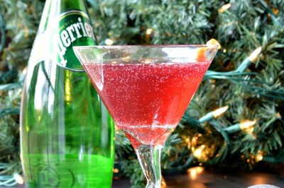 martini glass, christmas ornaments and a perrier bottle