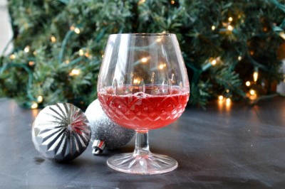 red mocktail and christmas ornaments