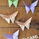 colorful origami butterflies on a wood table