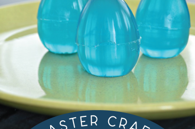 Three blue egg jelly soaps on a green plate