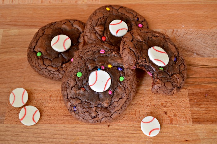 brownie cookies decorated with candy melts decorated to look like baseballs