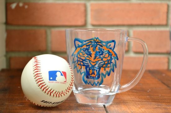 mug painted with a vintage Detroit Tigers logo next to a baseball