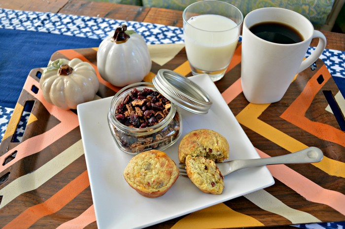 breakfast tray with homemade granola, egg bites, milk, and coffee