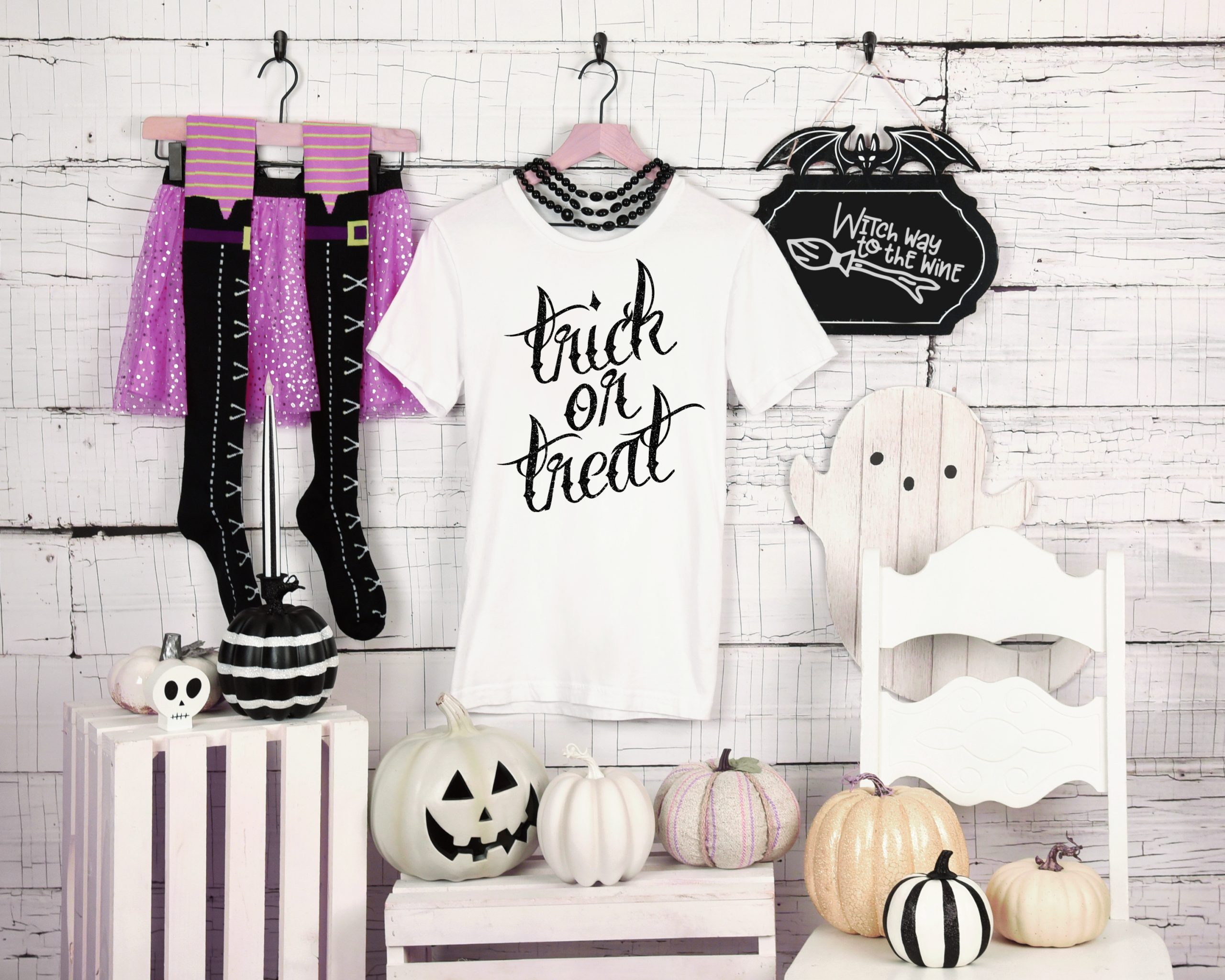 Trick or Treat shirt surrounded by Halloween costume pieces