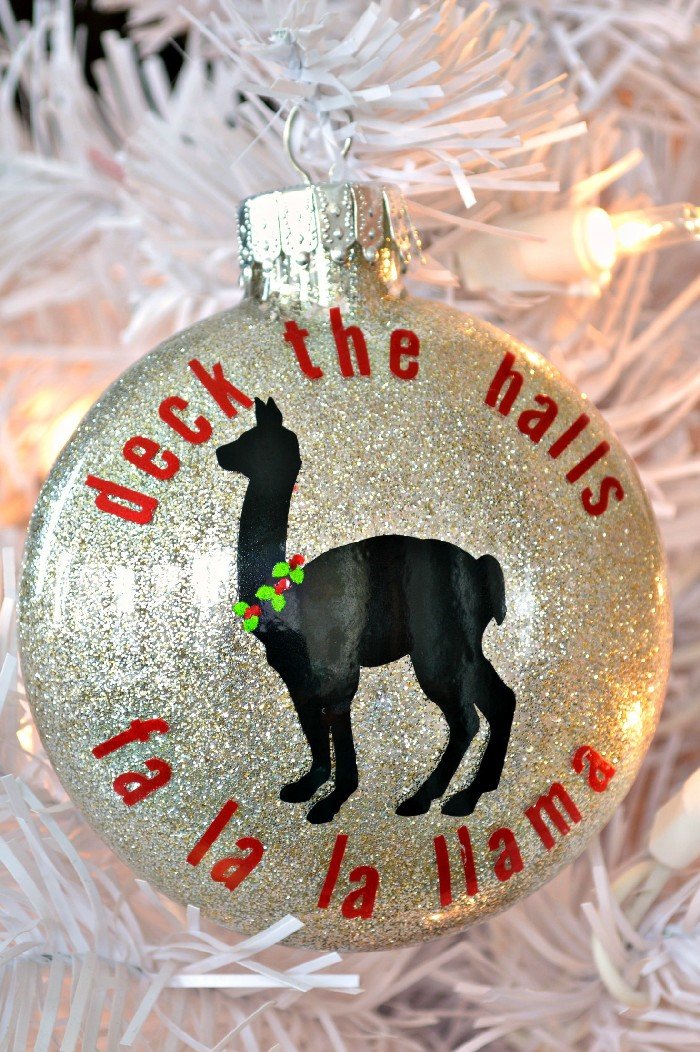 glittery llama christmas ornament on a white tree