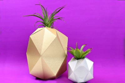 geometric paper vases cut with Cricut machine on a purple background