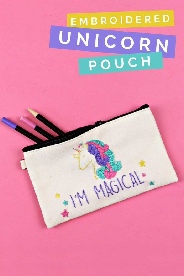 Pencil pouch with embroidered unicorn on a pink background