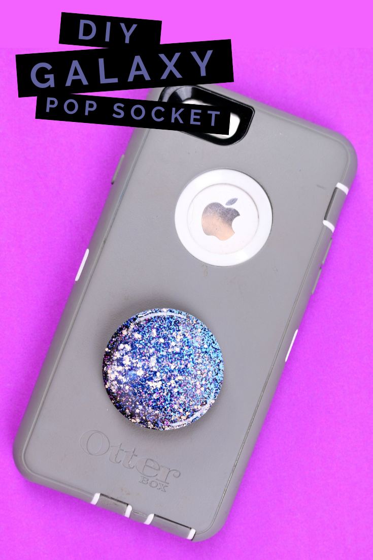 Grey phone case with a glittery Pop Socket