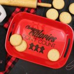 red tray with vinyl Christmas Calories Don't Count next to cookies and a rolling pin