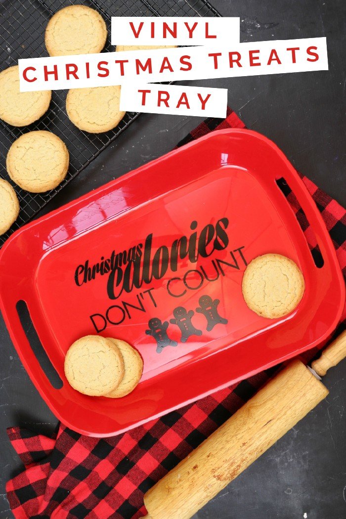 cookies, rolling pin, and red tray with vinyl reading Christmas Calories Don\'t Count