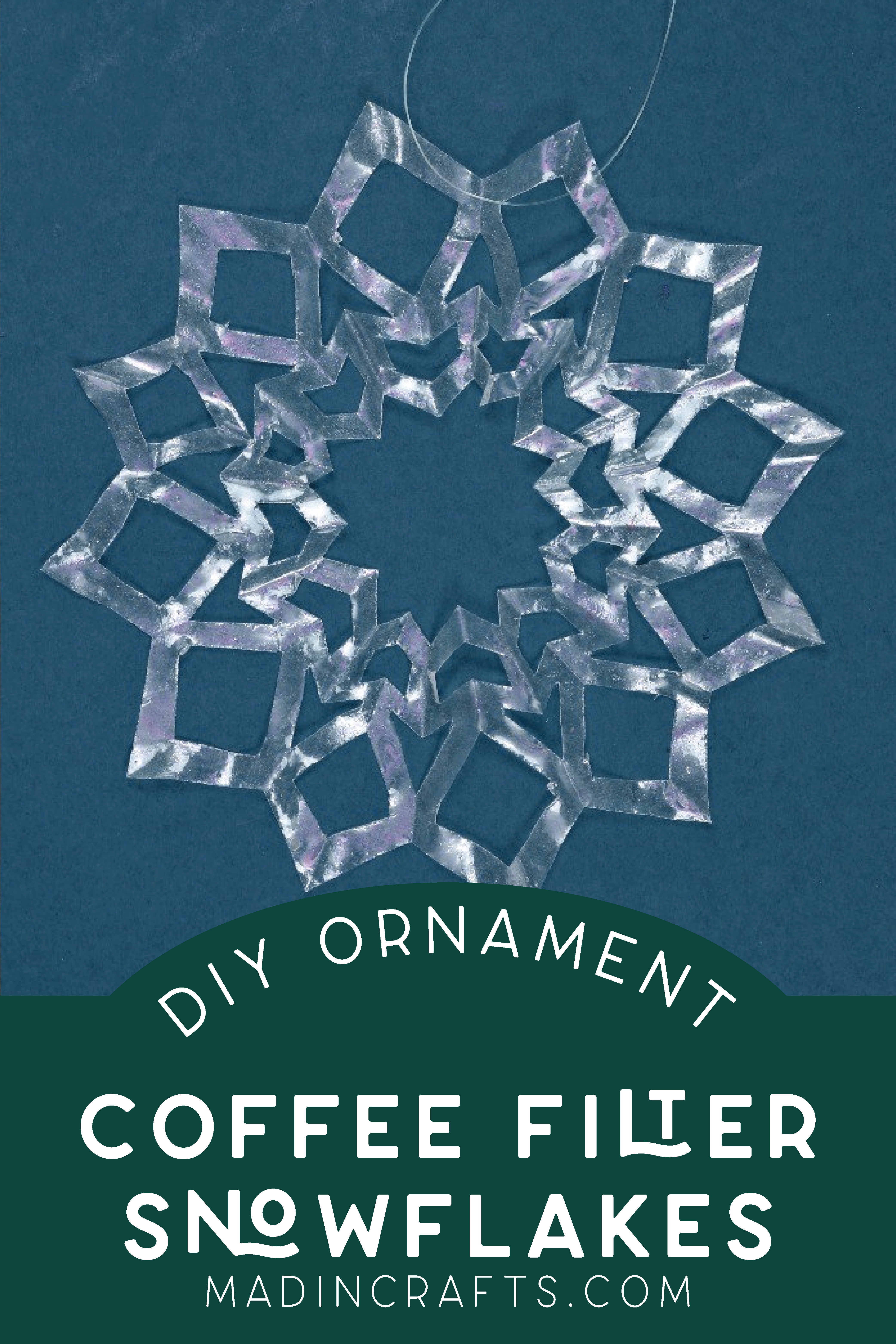 clear coffee filter snowflake ornament on a blue background