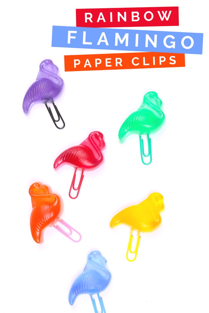colorful resin flamingo paper clips on a white background