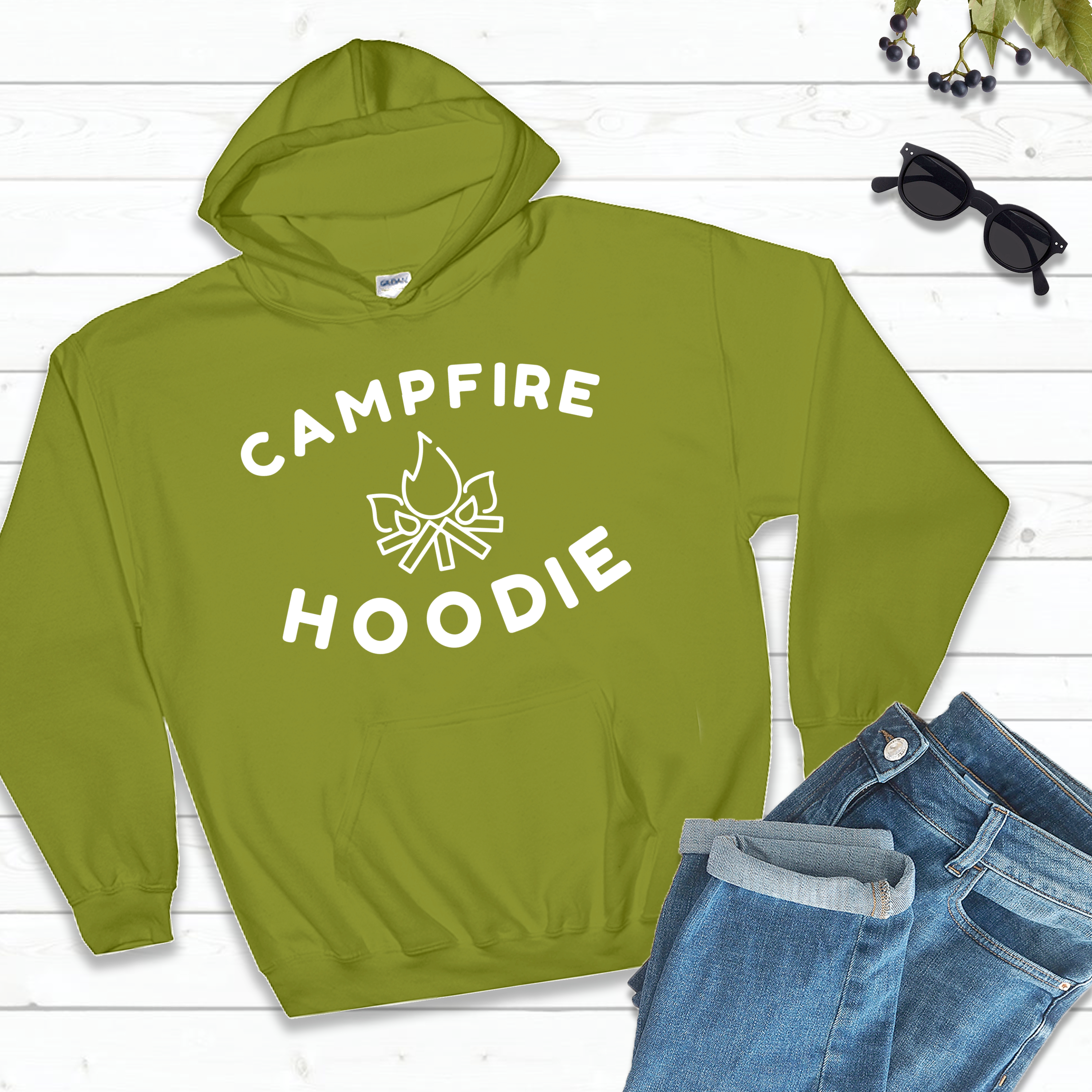 light green campfire hoodie, jeans, and sunglasses