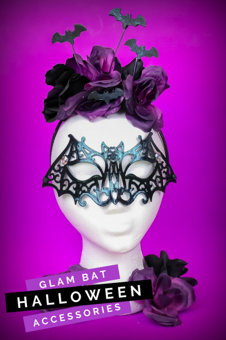 Halloween bat mask and purple flower headband on a foam head with a purple background