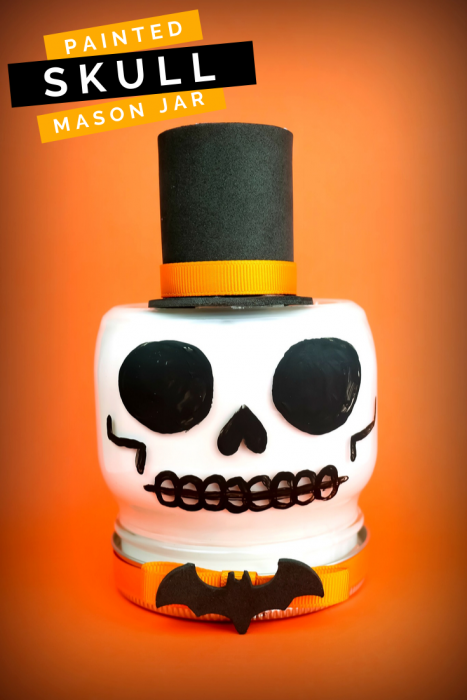 Mason jar to look like a skull on an orange background