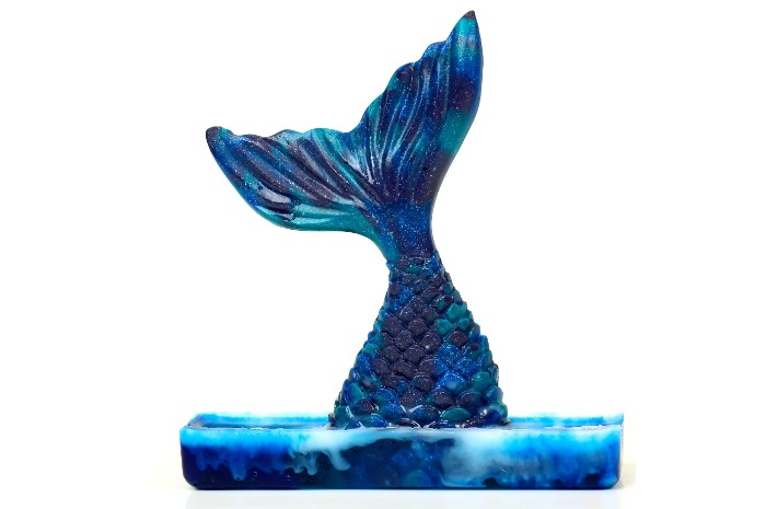 mermaid resin figurine on a white background