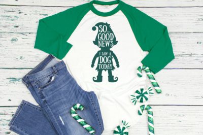 elf quote svg design on a t-shirt near jeans and ornaments