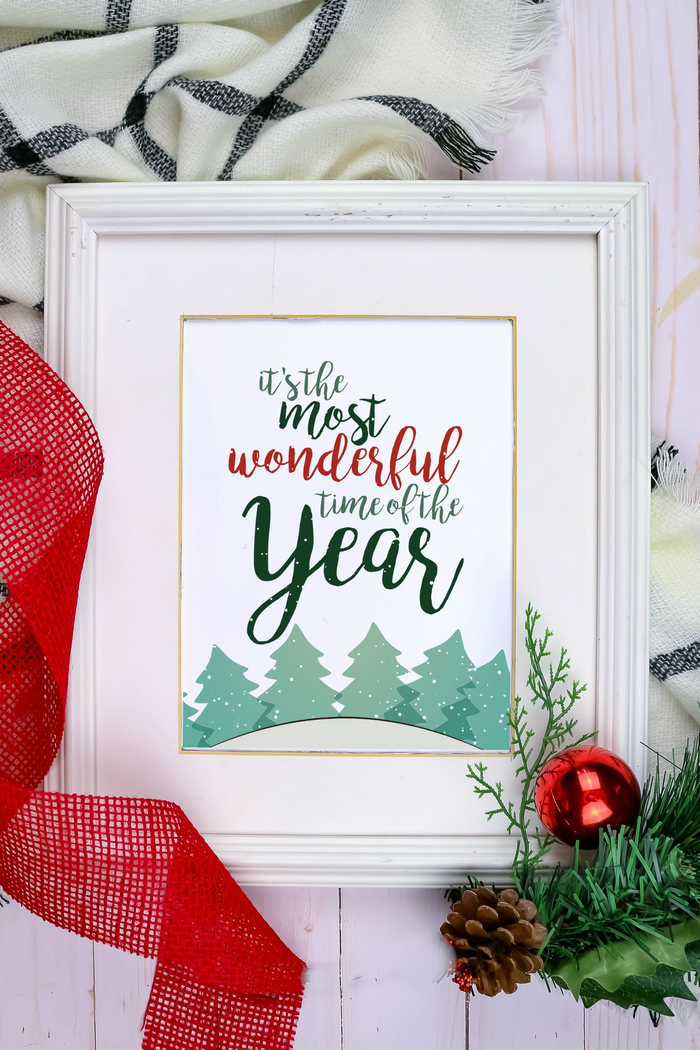 Farmhouse style Christmas card in a white frame with ribbon