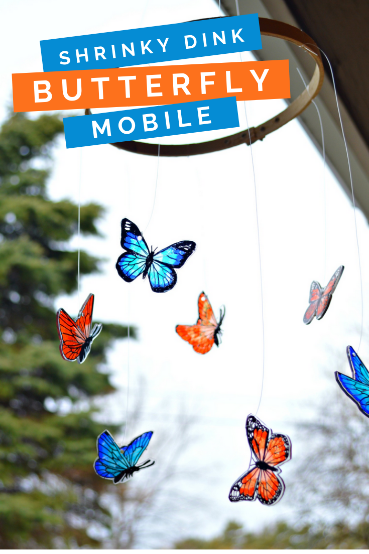 blue and orange shrink plastic butterfly mobile outside