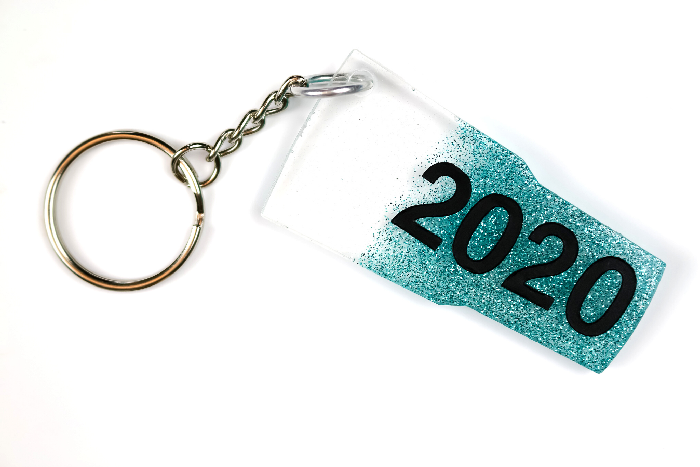 close up of a glitter tumbler key chain with 2020