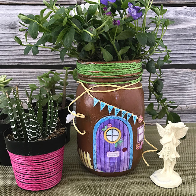 fairy house painted mason jar with plants