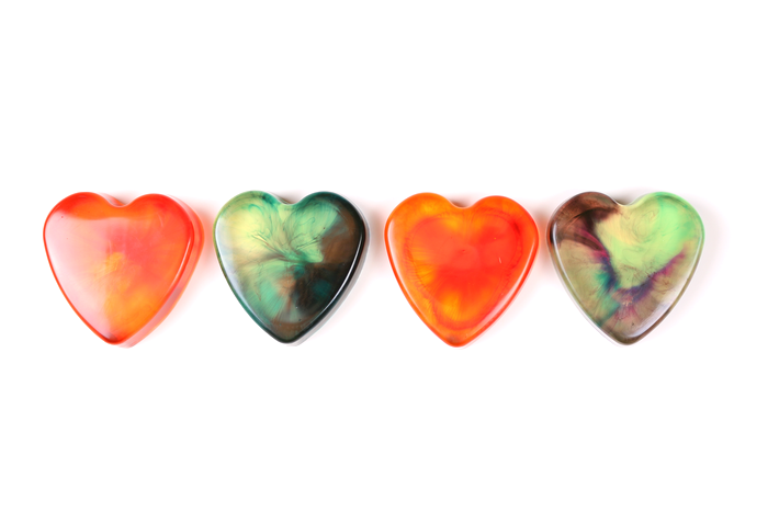 4 colorful resin heart paperweights