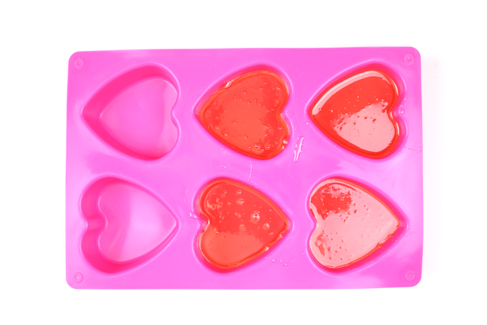 silicone heart mold filled with resin