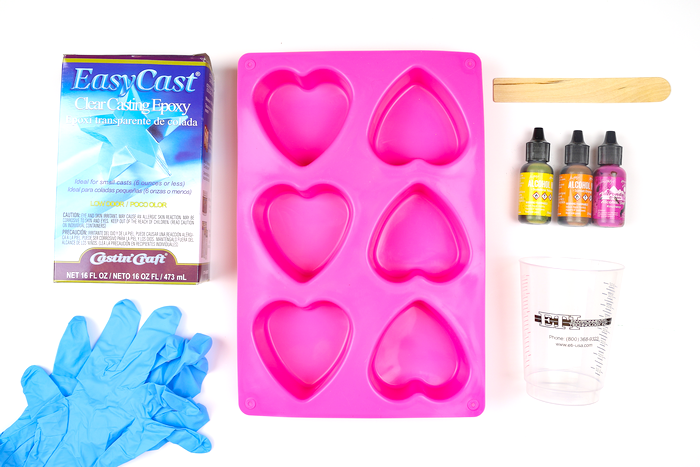 resin supplies, alcohol ink, and silicone heart mold