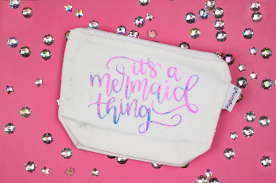 zipper pouch with a vinyl design that says it's a mermaid thing on a pink background with rhinestones