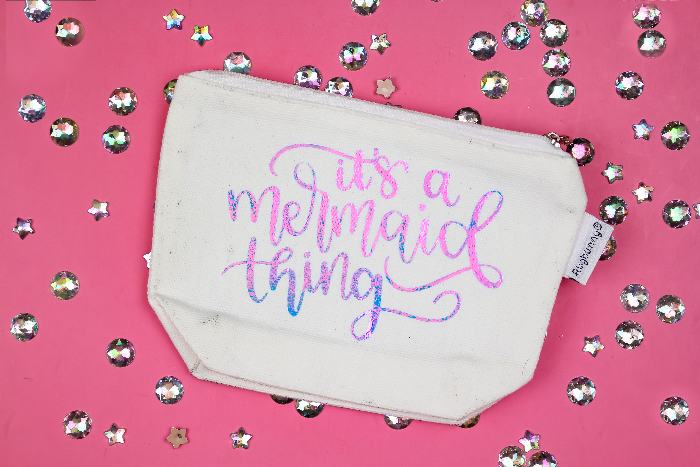 zipper pouch with a vinyl design that says it\'s a mermaid thing on a pink background with rhinestones