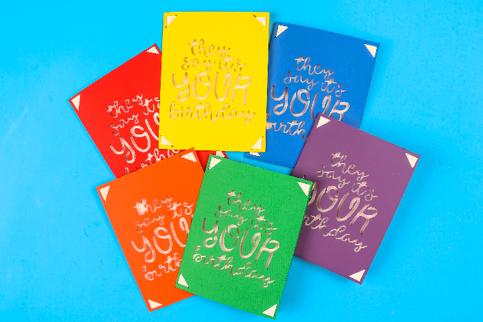 colorful They Say It\'s Your Birthday Cricut insert cards on a blue background